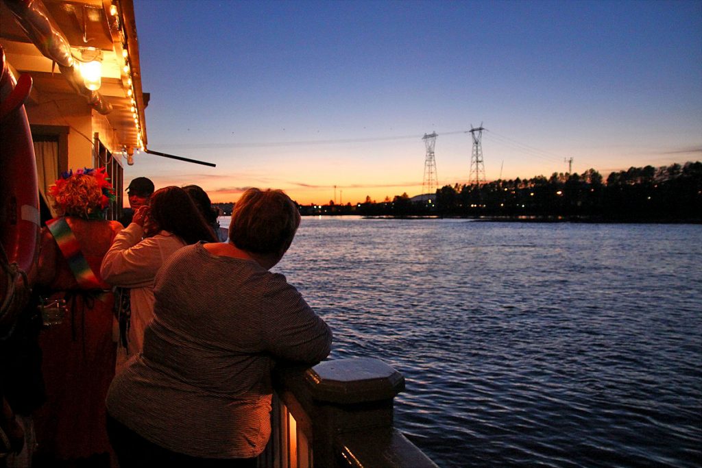 Guests enjoying a sunset cruise aboard the MV Native on the Fraser River
