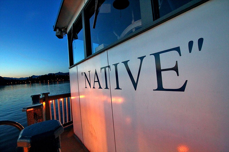 MV Native nameplate closeup photographed at dusk